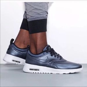 Metallic Grey Nike Thea